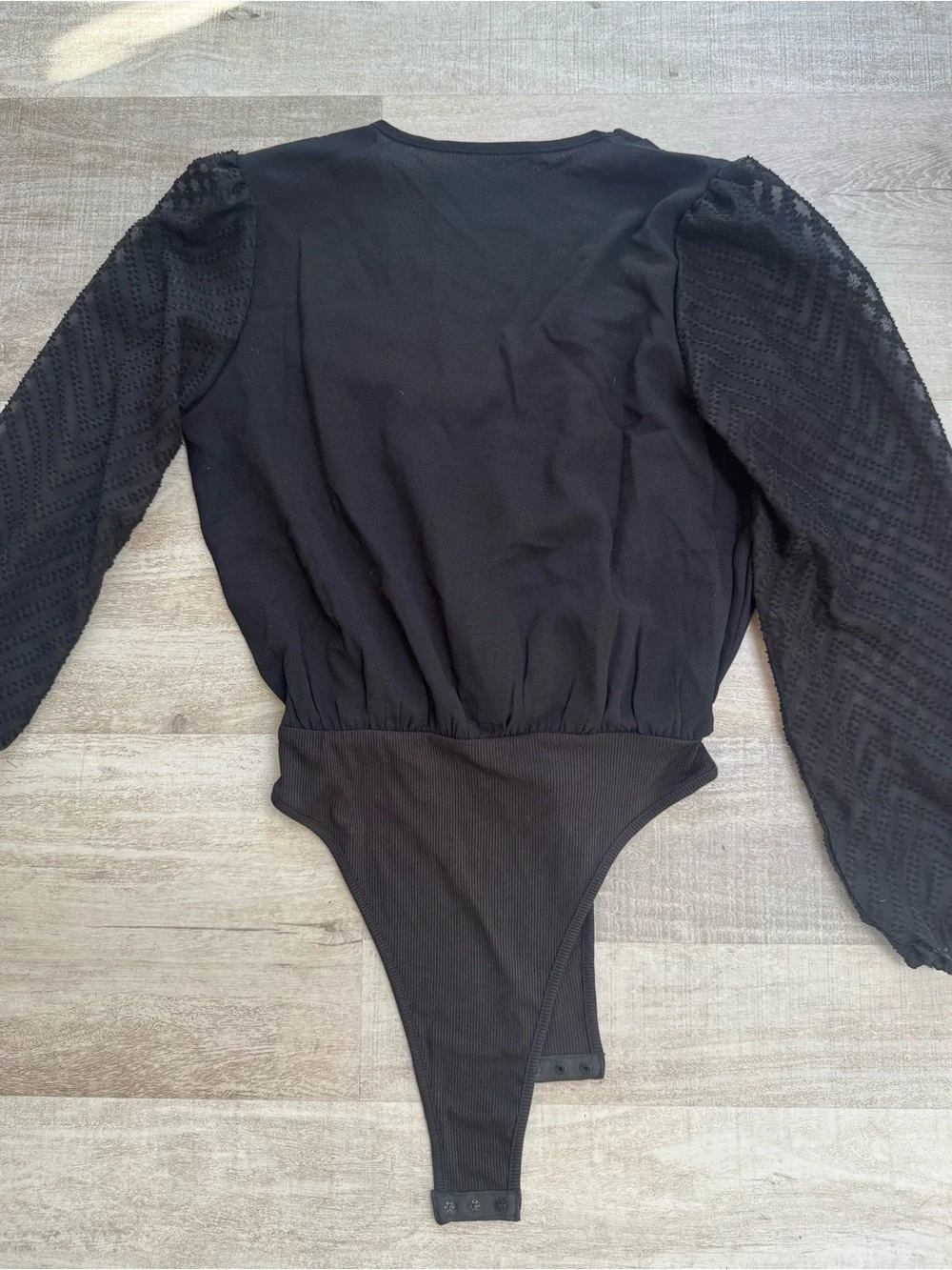 Black Long-Sleeve women's One-Piece Bodysuit size small